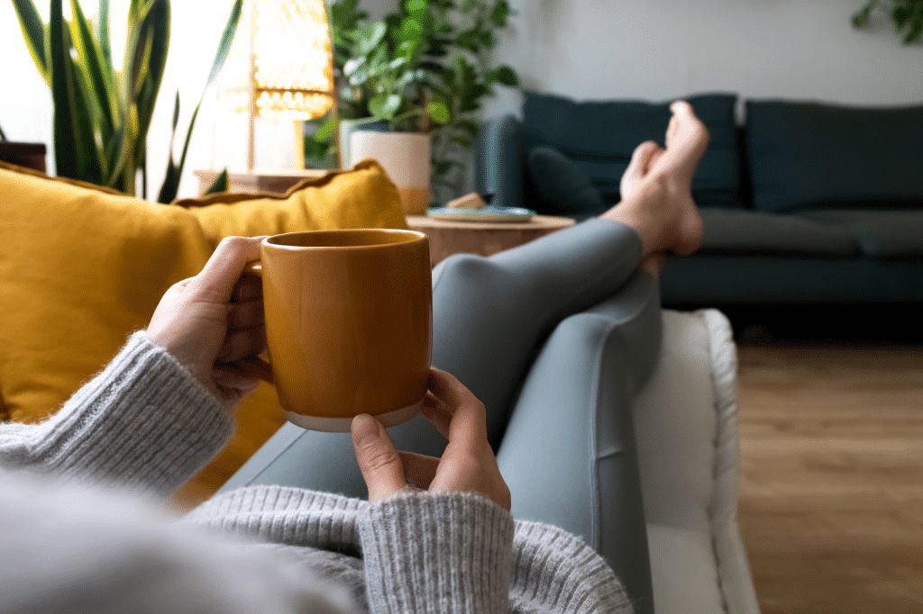 Picture of woman relaxing and drinking tea, stress management. 
