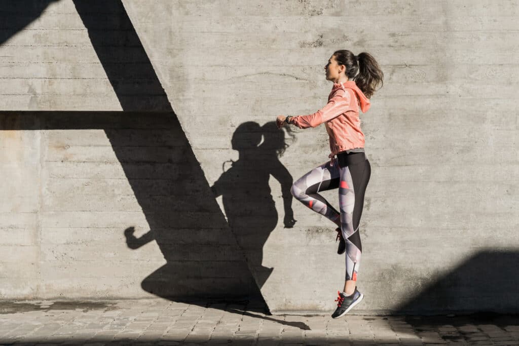 Woman exercising for gut health.